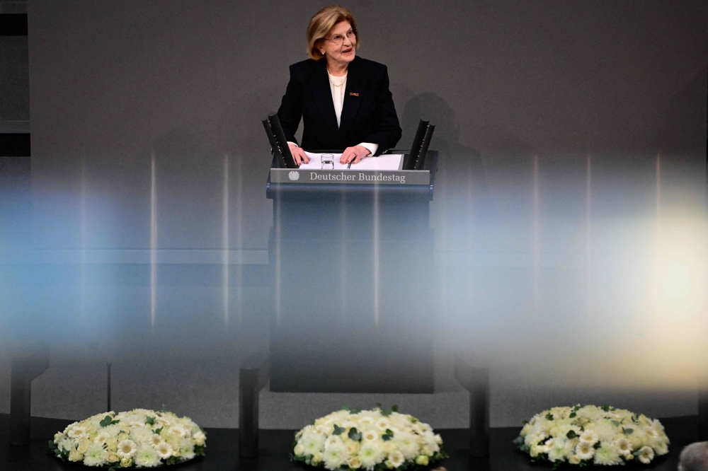 Holocaust survivor Eva Szepesi, who was liberated from Auschwitz at the age of 12, told German Chancellor Olaf Scholz, his cabinet and MPs in a Bundestag ceremony that she was heartened by hundreds of thousands of Germans joining pro-democracy rallies. — AFP pic