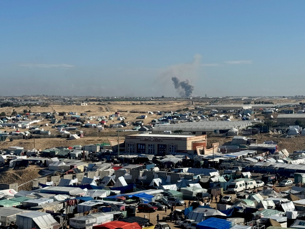 Smoke rises during an Israeli ground operation in Khan Younis, amid the ongoing conflict between Israel and Hamas, as seen from a tent camp sheltering displaced Palestinians in Rafah, in the southern Gaza Strip January 31, 2024. — Reuters pic