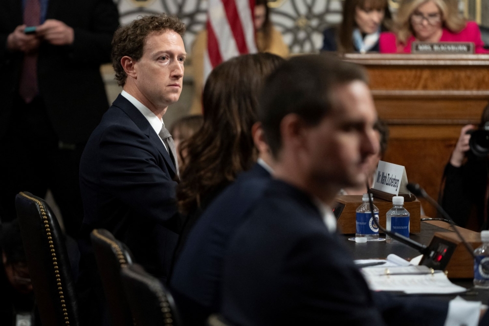 Meta CEO Mark Zuckerberg gave a public apology in US Congress yesterday as hostile lawmakers grilled tech chiefs over the dangers that children face on social media platforms. — AFP pic