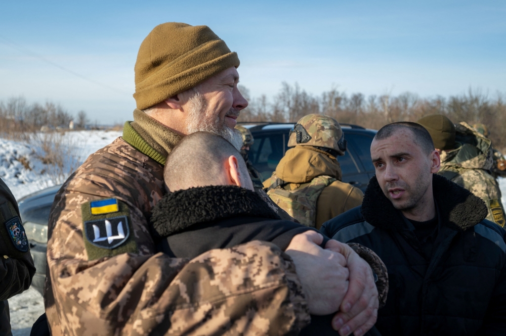 Ukrainian prisoners of war (POWs) are seen after a swap at an unknown location in Ukraine. — Reuters pic/Ukrainian Presidential Press Service handout