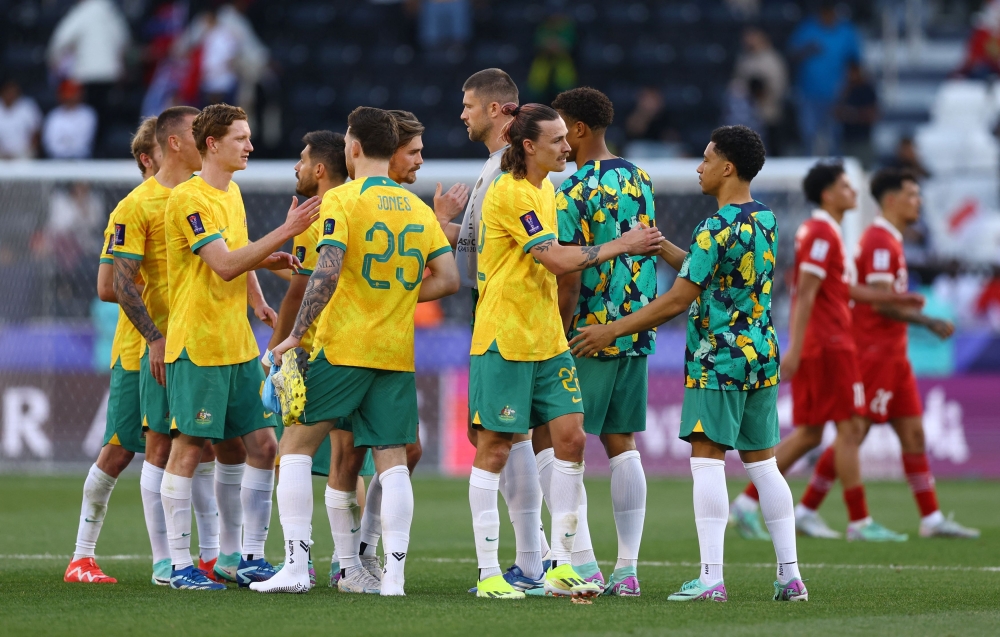 Australia's Jackson Irvine and teammates celebrate after the  AFC Asian Cup Round of 16 match against Indonesia at the Jassim bin Hamad Stadium, Al Rayyan January 28, 2024. — Reuters pic  