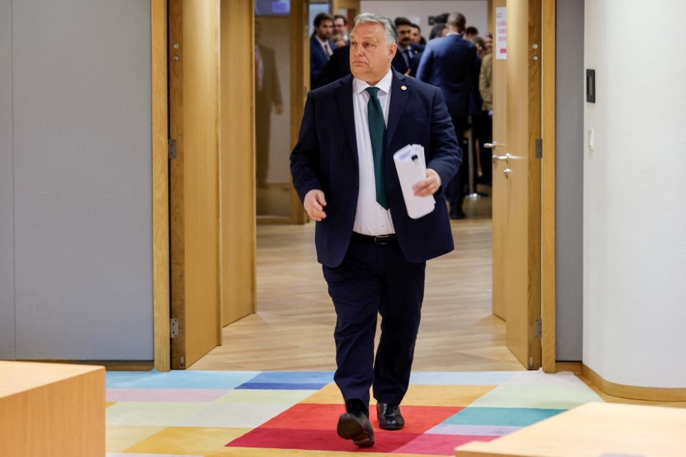 Hungary’s Prime Minister Viktor Orban arrives prior to the start of a European Council meeting at the European headquarters in Brussels, on February 1, 2024. — AFP pic