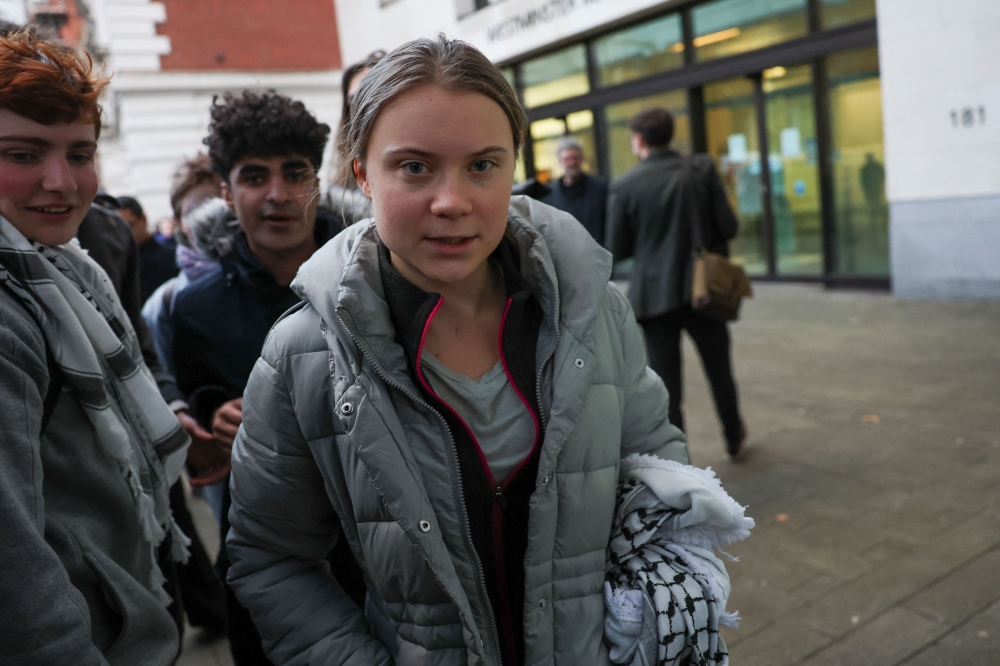 An English court yesterday threw out a public order case against climate activist Greta Thunberg, the judge criticising “unlawful” conditions police had imposed on protesters. — Reuters pic