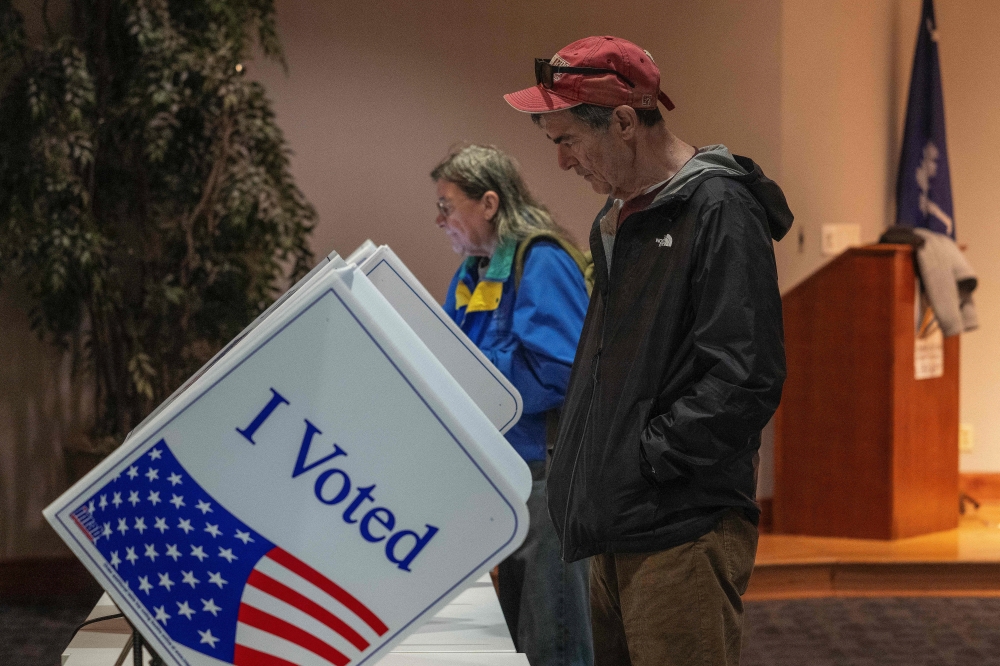People vote at polling location in Charleston, South Carolina, on February 3, 2024, during the South Carolina Democratic Primary. South Carolina is the first official Democratic primary of 2024 and is seen as a key test of support for US President Joe Biden among Black voters for his re-election battle with Donald Trump. — AFP pic