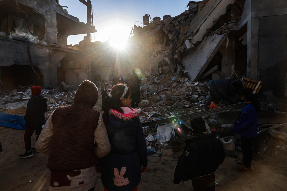 People check the damage following Israeli bombardment in Rafah in the southern Gaza Strip on February 3, 2024, as fighting continues between Israel and the Palestinian Hamas group. — AFP pic