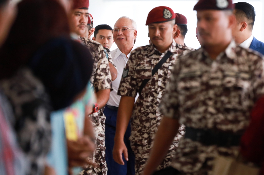 Former primer minister Datuk Najib Razak arrived during 1MDB trial case in Kuala Lumpur High Court on January 29, 2024. — Picture by Miera Zulyana