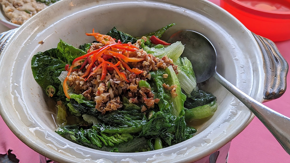 The conventionally ordinary and bland romaine lettuce gets a great boost of flavour from a combination of chillies and dried seafood.