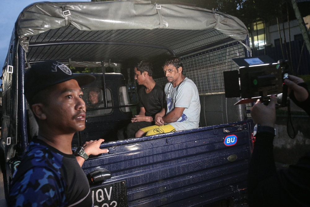 Two undocumented migrants who broke out from the Immigration Depot in Bidor on Thursday were captured at the Tapah rest area. — Picture by Farhan Najib