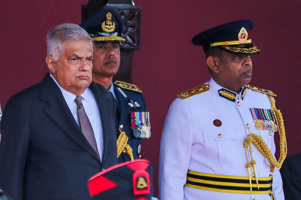 Sri Lankan President Ranil Wickremesinghe (left) attends the Sri Lanka’s 76th Independence Day celebrations at the Galle Face Green in Colombo. — AFP pic