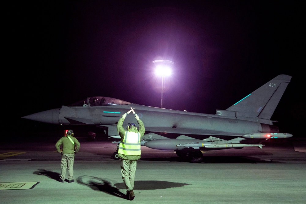 A handout picture released by the British Ministry of Defence (MOD) on February 3, 2024 shows a RAF Typhoon FGR4 aircraft preparing to take off to conduct further strikes against targets in Yemen. — British Ministry of Defence handout via AFP