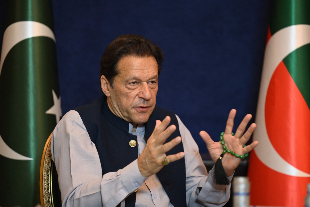 Pakistan's former Prime Minister Imran Khan was jailed in the build-up to the campaign, while his Pakistan Tehreek-e-Insaaf (PTI) has been heavily restricted from campaigning for Thursday’s vote and banned from the television airwaves. — AFP pic