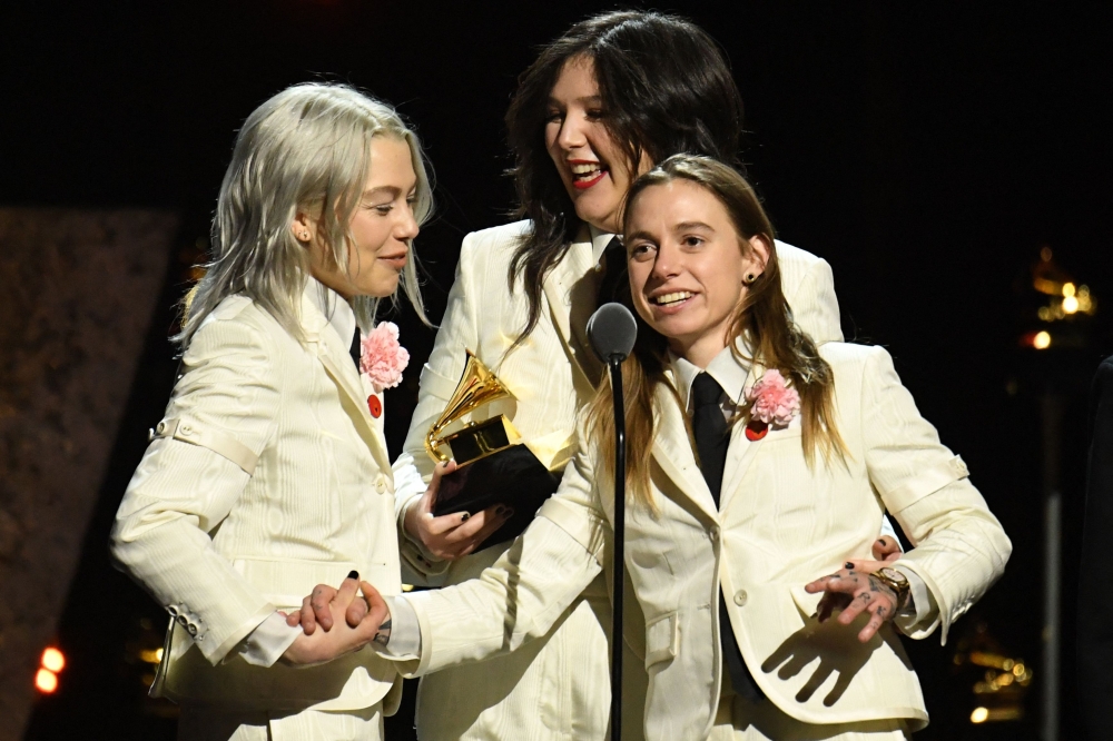 Julien Baker, Phoebe Bridgers and Lucy Dacus of US indie group boygenius accept the award for Best Rock Performance for 