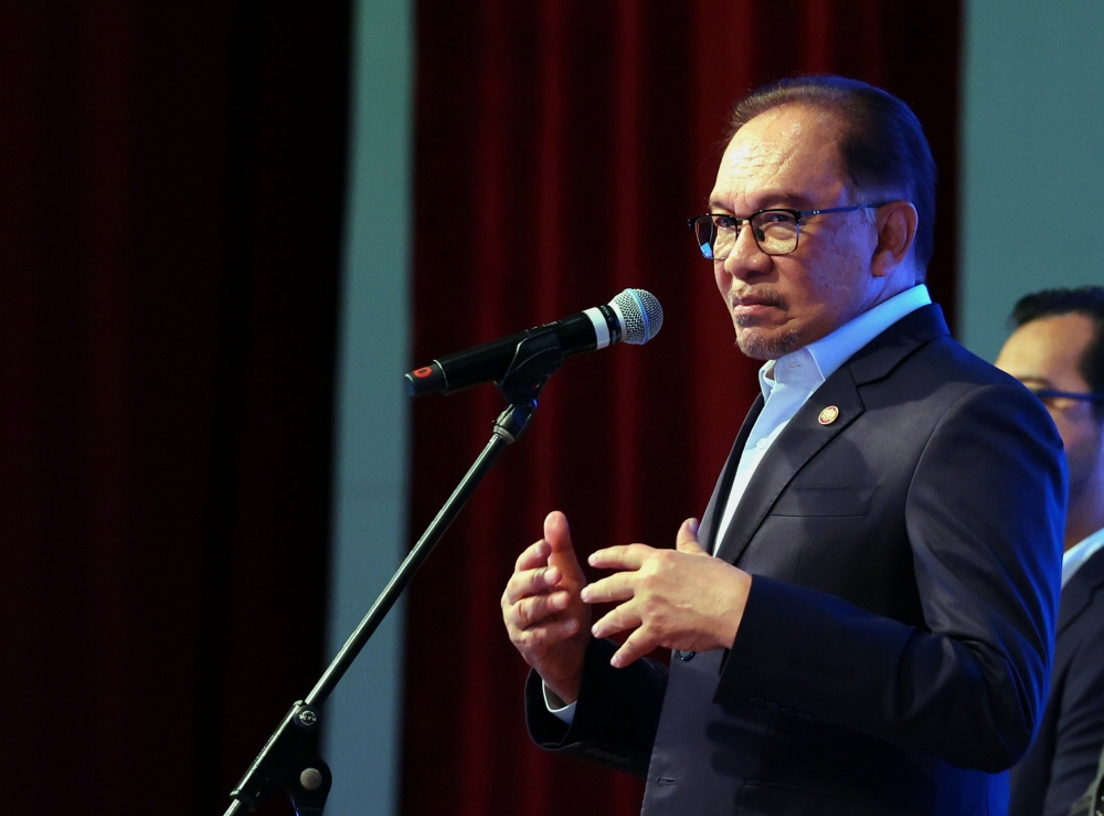 Prime Minister Datuk Seri Anwar Ibrahim speaks during the monthly assembly at the Prime Minister's Department in Putrajaya February 5, 2024. — Bernama pic