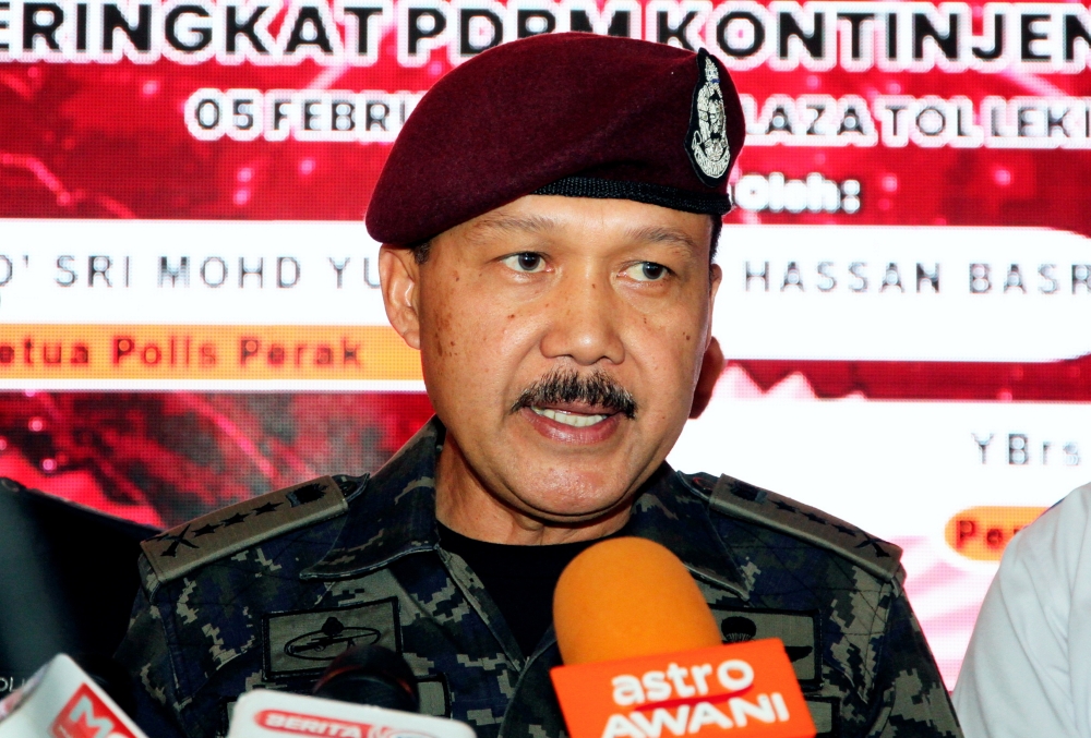 Perak police chief Datuk Seri Mohd Yusri Hassan Basri speaks to reporters in Lumut February 5, 2024. — Bernama pic