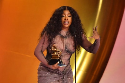 SZA and Swift win Grammys, as Tracy Chapman wows gala audience