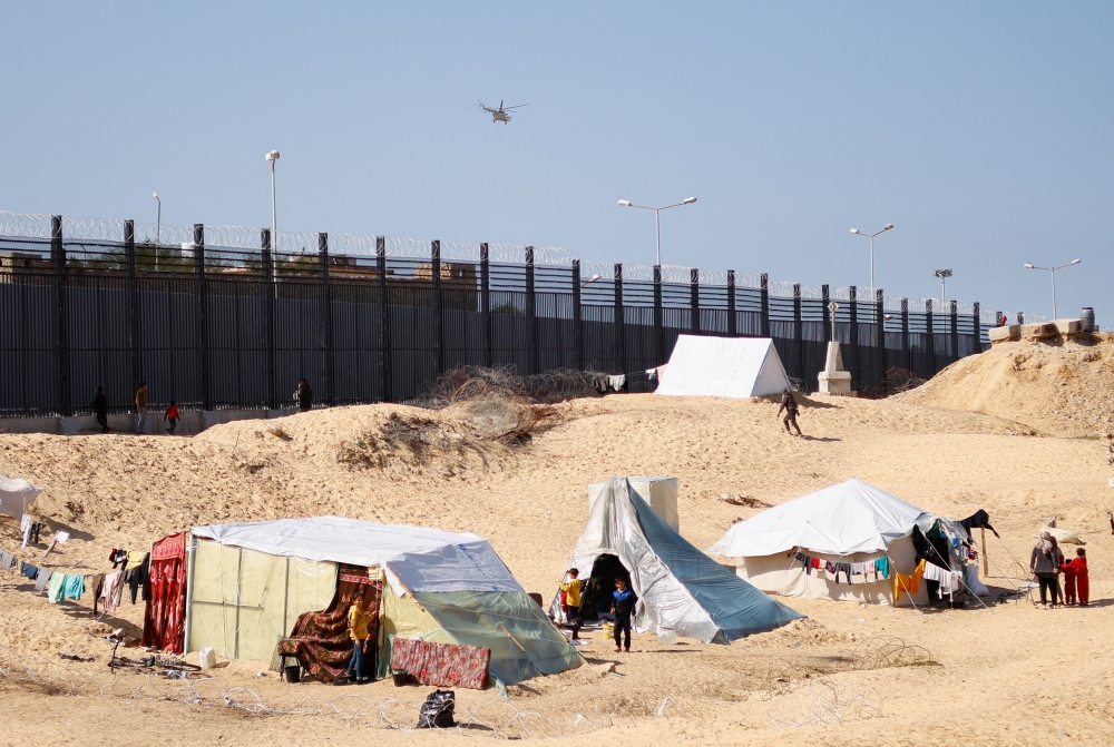 Displaced Palestinians, who fled their houses due to Israeli strikes, take shelter in a tent camp, amid the ongoing conflict between Israel and Hamas, at the border with Egypt, in Rafah in the southern Gaza Strip, February 7, 2024.  — Reuters pic