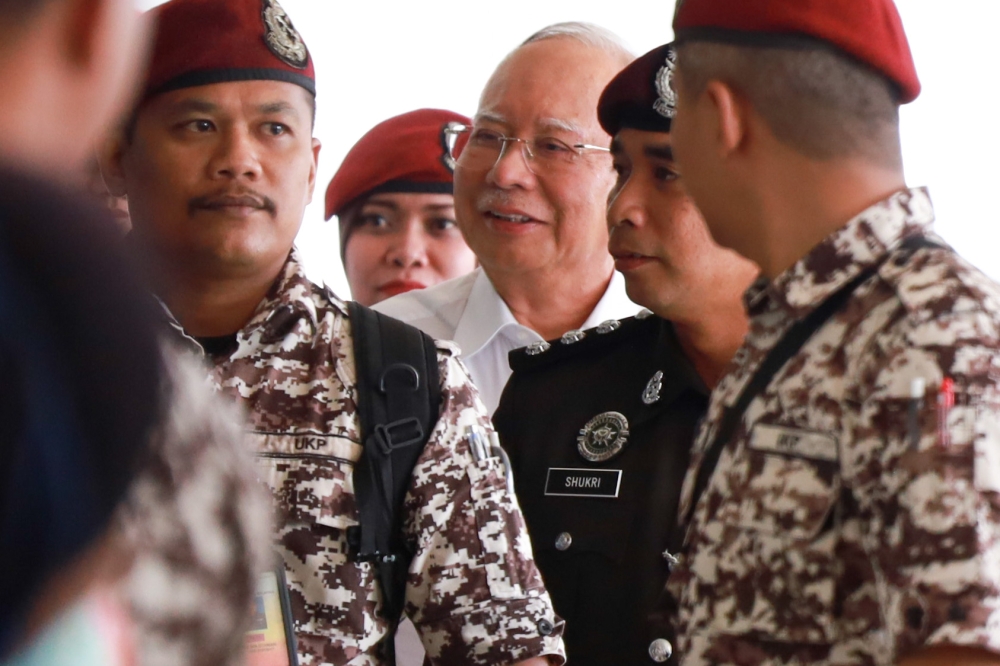 Umno’s top leadership held a three-hour emergency meeting over the weekend to discuss the Pardons Board’s decision to grant the former prime minister only a partial pardon, and later issued a statement saying they accepted the ruling but will not stop the fight to free Najib. — Picture by Miera Zulyana