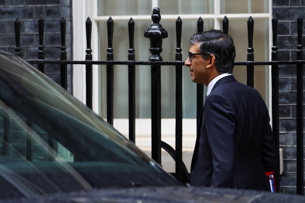 In an exchange with Labour leader Keir Starmer, who had said Ghey’s mother was watching, British Prime Minister Rishi Sunak said 'defining a woman' was on a list of Starmer’s broken promises, joking it had been 'only 99 per cent of a U-turn'. — Reuters pic