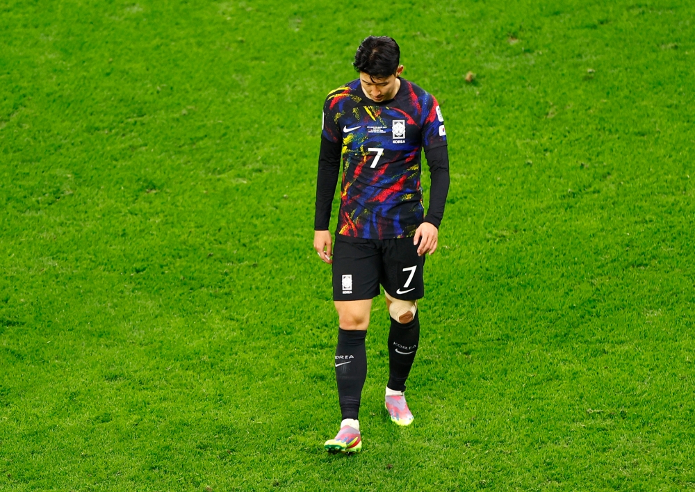 South Korea's Son Heung-min looks dejected after being eliminated from the AFC Asian Cup. — Reuters pic 