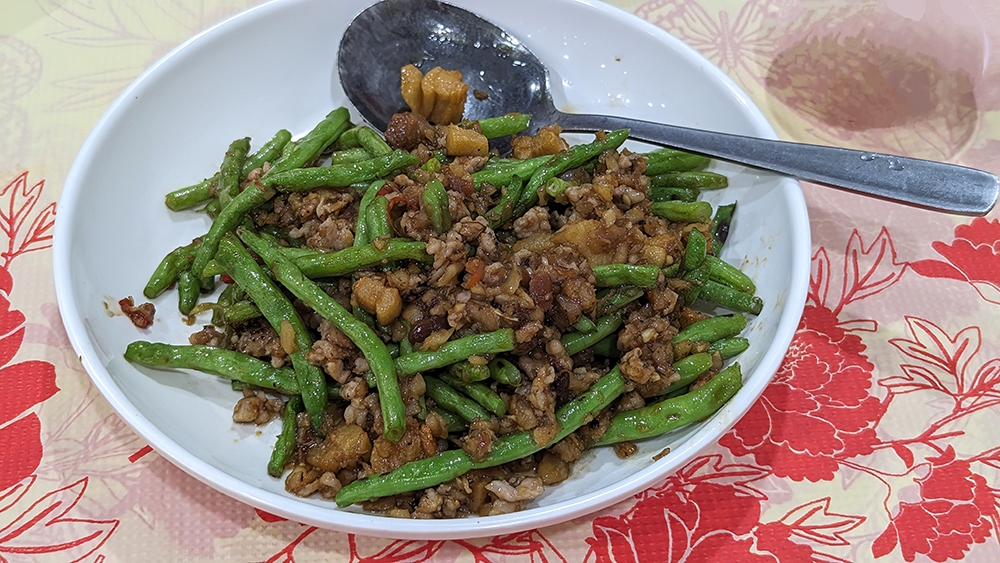 Green beans fried with minced pork, though the ratio seems skewed one way.