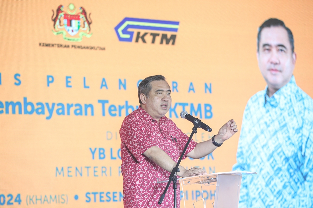 Transport Minister Anthony Loke speaks during the launch of the Keretapi Tanah Melayu Berhad (KTMB) open payment system at the Ipoh Railway Station, February 8, 2024. — Picture by Farhan Najib