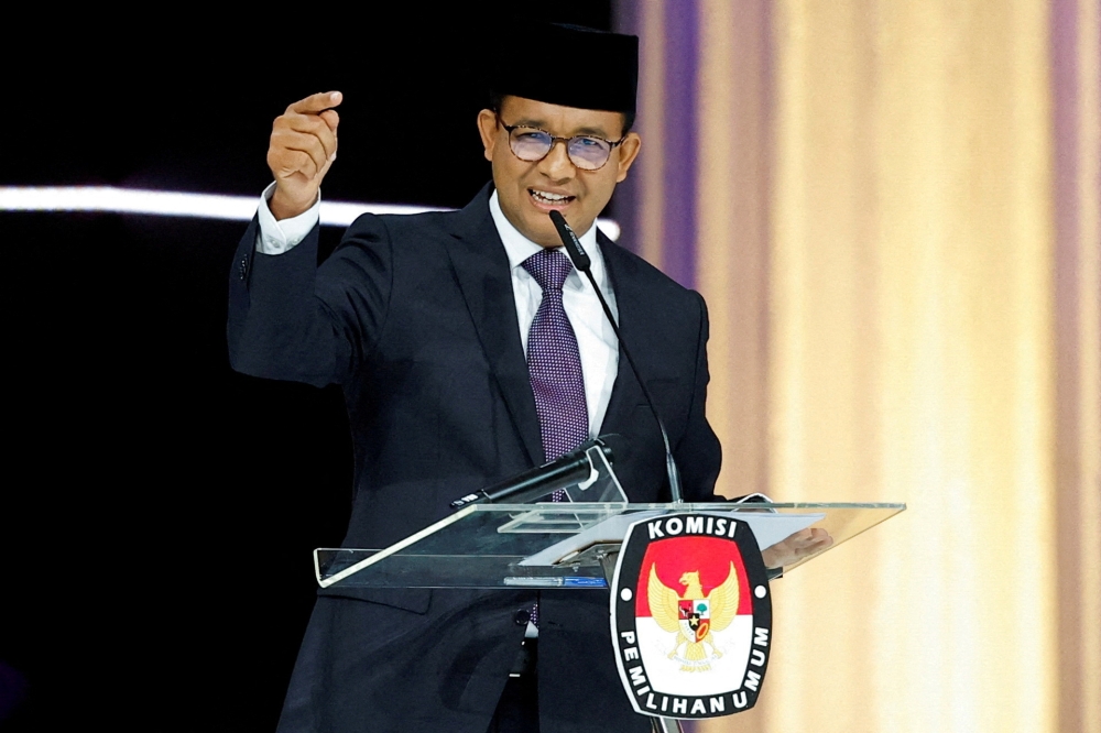 Presidential candidate and former Jakarta Governor Anies Baswedan speaks during a televised debate ahead of the general election at the Jakarta Convention Center in Jakarta, Indonesia, February 4, 2024. — Reuters pic