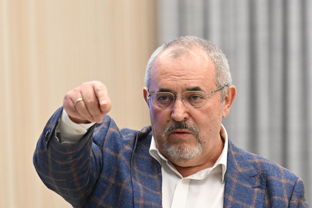 Boris Nadezhdin, the Civic Initiative Party presidential hopeful, gestures during a meeting at the Central Election Commission in Moscow February 8, 2024. — AFP pic 