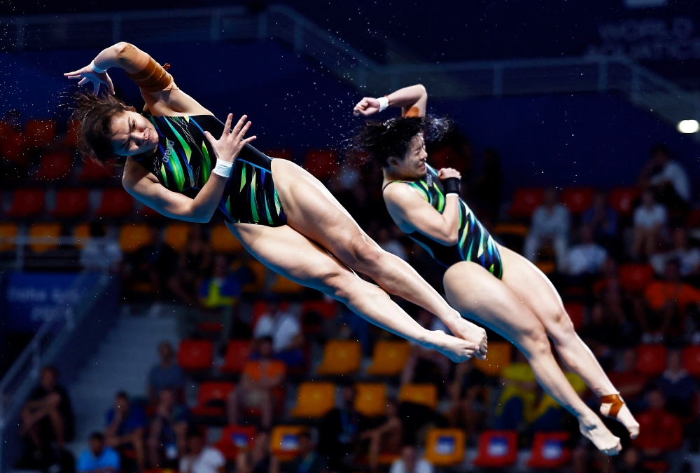 Malaysia’s Nur Dhabitah Sabri and Wendy Ng Yan Yee in action during the women’s 3m synchronised final at the World Aquatics Championships, Hamad Aquatic Centre, Doha, February 7, 2024. — Reuters pic 