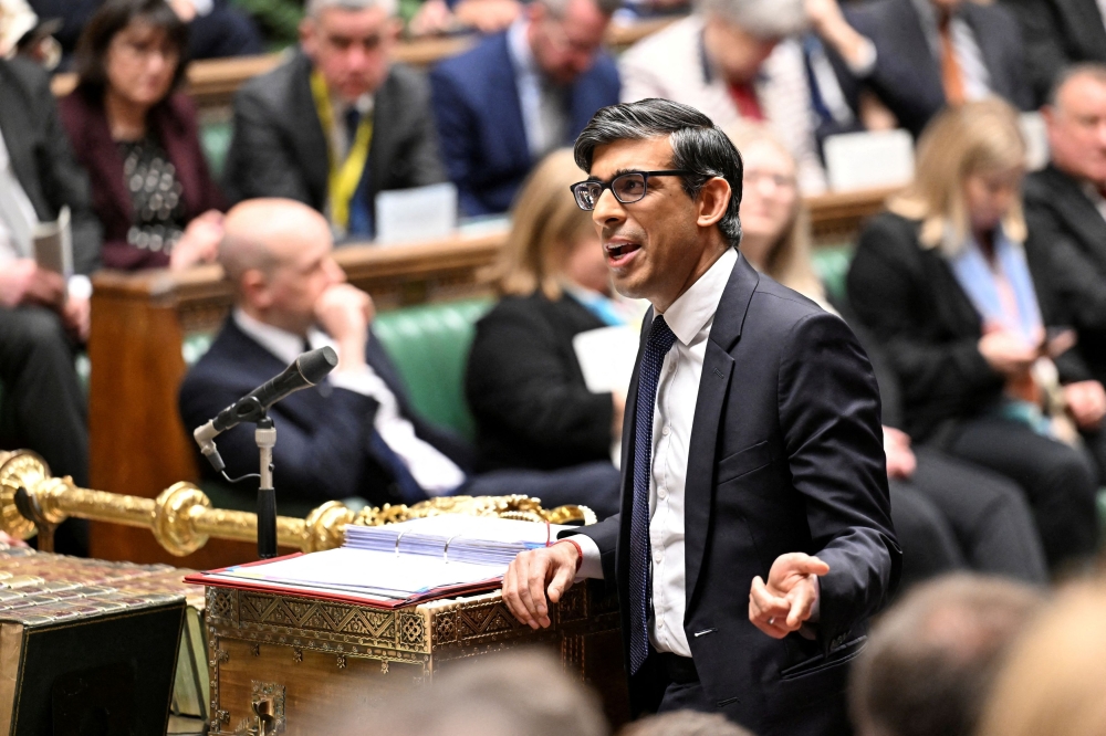 British Prime Minister Rishi Sunak declined today to apologise for a gender identity jibe at opposition leader Keir Starmer, which drew criticism in the light of the widely reported recent murder of a transgender girl. — UK Parliament/Maria Unger handout pic via Reuters