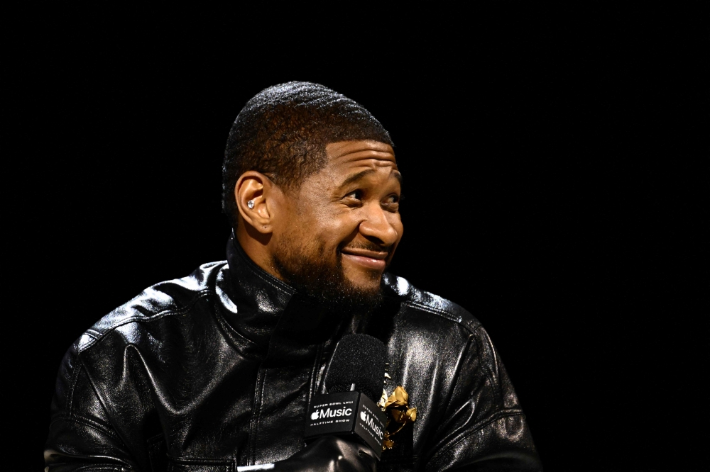 US singer and songwriter Usher speaks during a press conference ahead of Super Bowl LVIII in Las Vegas. — AFP pic