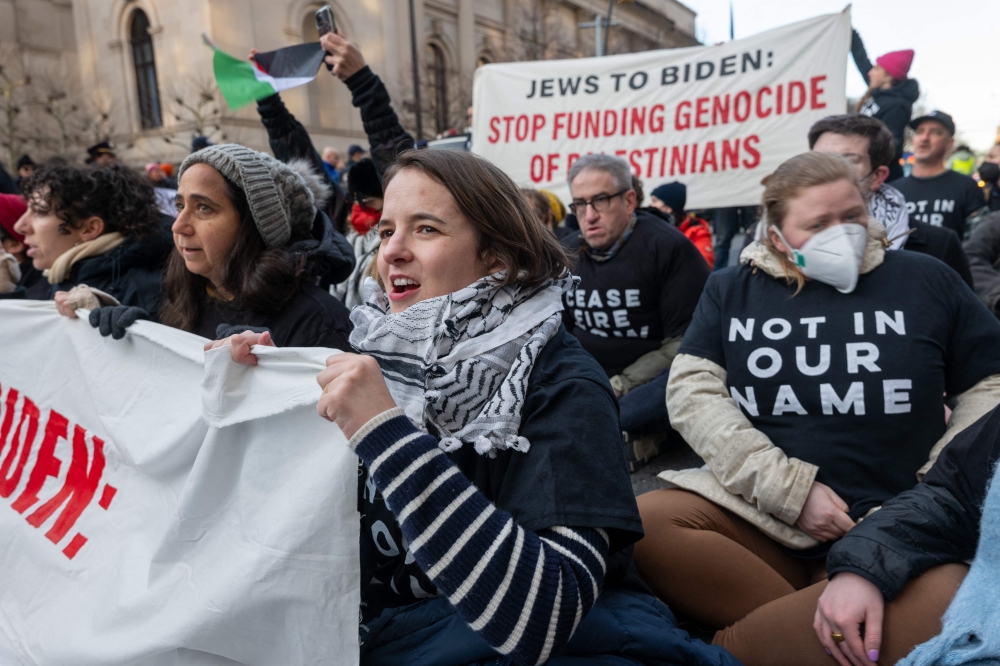 Members of the activist group Jewish Voice for Peace join others in protesting President Joe Biden’s visit to Manhattan due to his continued support for Israel in its war against Hamas. — AFP pic 
