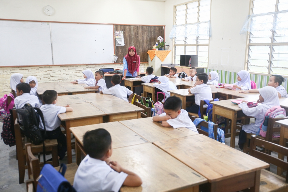 The author says students are simply not going to tinker with subjects for which their teachers and parents demand non-stop do-well-now results. — Picture by Farhan Najib