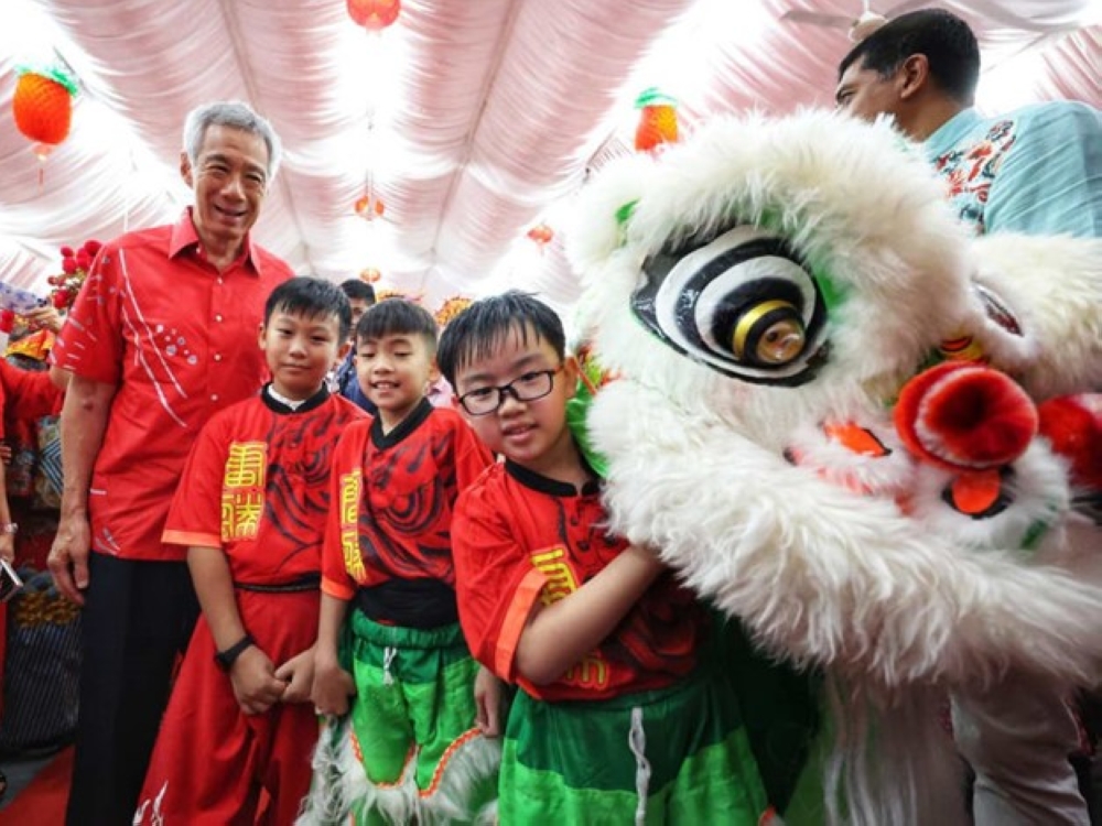 Prime Minister Lee Hsien Loong urged couples to consider having children and having them earlier. — TODAY pic
