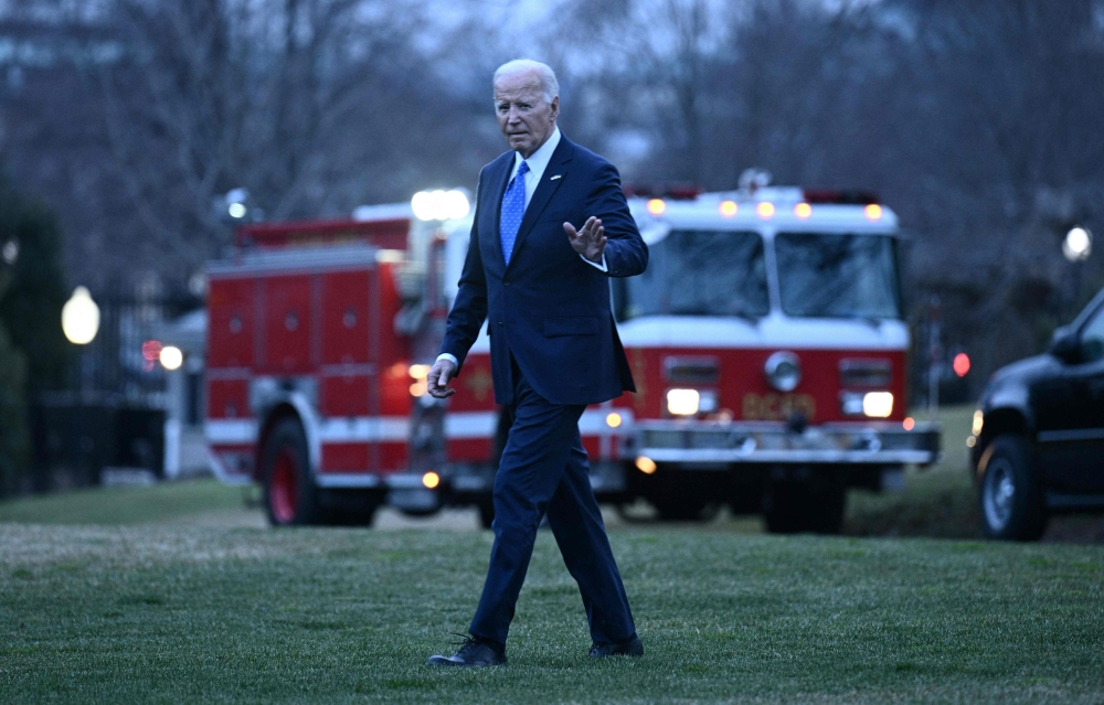 US President Joe Biden walks to Marine One on the South Lawn of the White House in Washington, DC, on February 9, 2024. — AFP pic