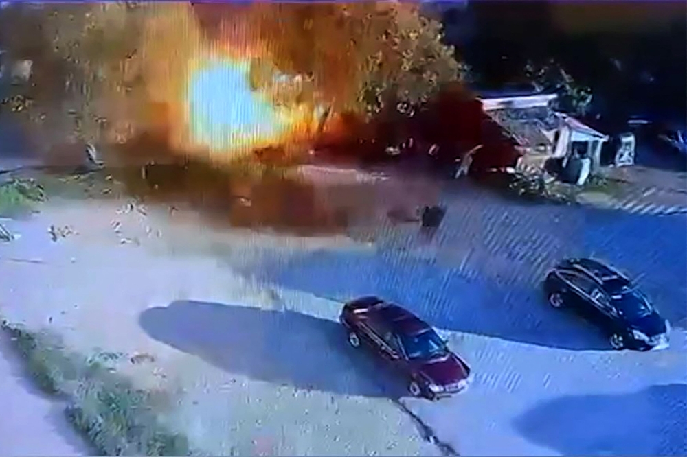 This grab taken from a UGC video released on social media on February 8, 2024 shows a fireball errupting after an Israeli strike on a vehicle in Lebanon's southern city of Nabatieh, amid increasing cross-border tensions as fighting continues with Hamas militants in Gaza. — AFP/Social media pic