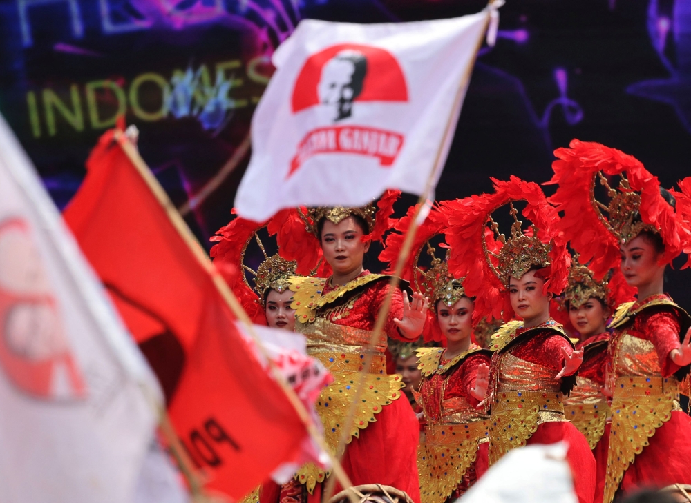 Dancers perform at a campaign rally for Ganjar Pranowo, presidential candidate of the ruling Indonesian Democratic Party of Struggle (PDI-P), at Pakansari Stadium in Bogor, West Java province, Indonesia, February 9, 2024. — Reuters pic