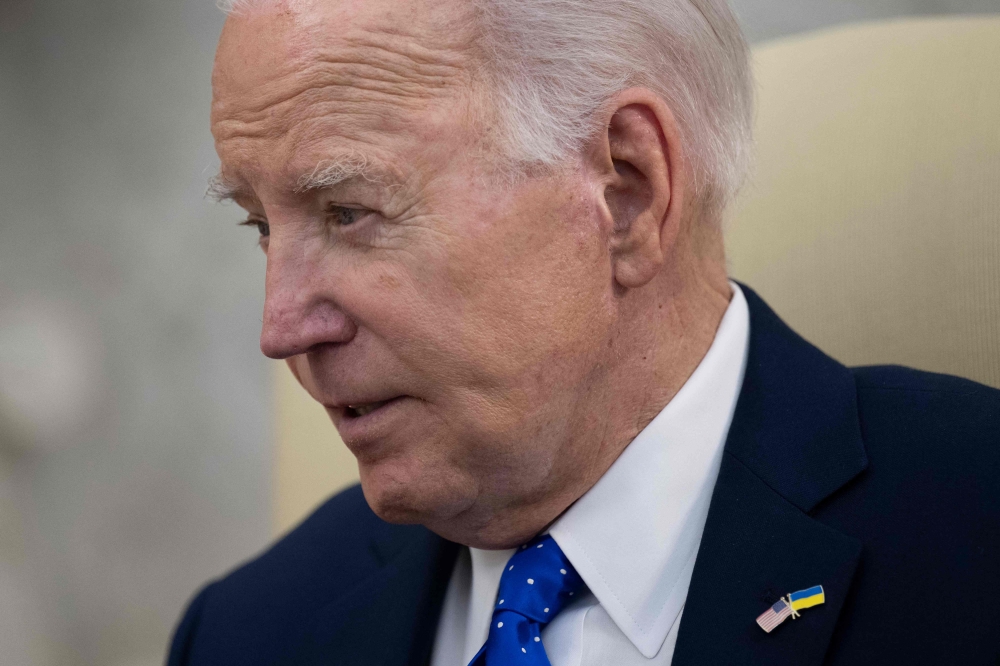 US President Joe Biden speaks during a meeting with German Chancellor Olaf Scholz in the Oval Office of the White House in Washington, DC, February 9, 2024. — AFP pic
