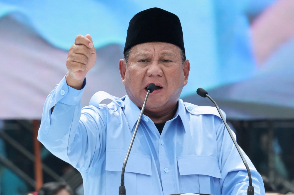Indonesia’s Defence Minister and presidential candidate Prabowo Subianto gestures as he addresses his supporters during a campaign rally in Jakarta, Indonesia February 10, 2024. — Reuters pic