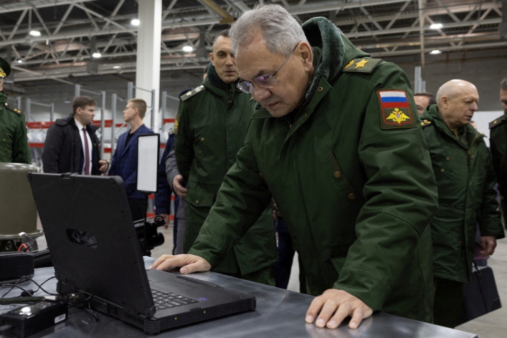 Russian Defence Minister Sergei Shoigu inspects the production of unmanned aerial vehicles (UAV)  at a military plant in the Udmurt Republic, Russia, in this picture published February 10, 2024. — Reuters pic