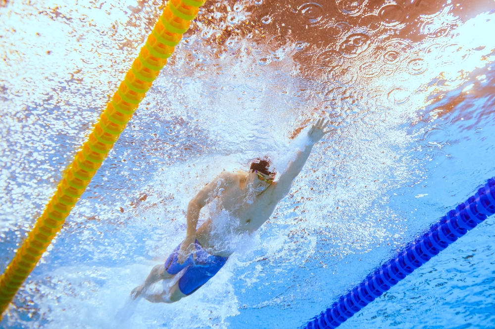 China's Zhanle Pan competes in the final of the men's 4X100m freestyle relay swimming event during the 2024 World Aquatics Championships at Aspire Dome in Doha on February 11, 2024. — AFP pic