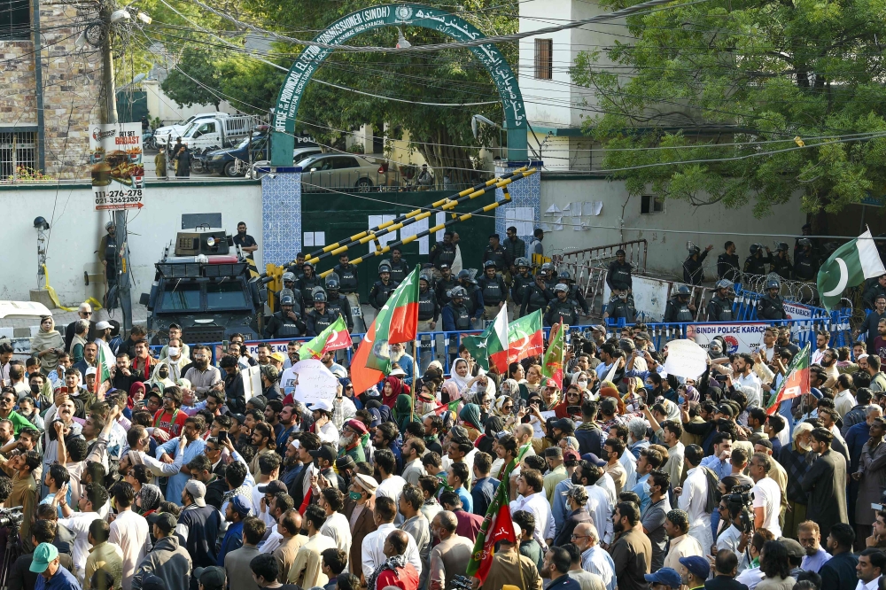 Pakistan police warned on February 11 they would come down hard on illegal gatherings after the party of jailed former prime minister Imran Khan urged supporters to protest against alleged rigging in last week’s election. — AFP pic