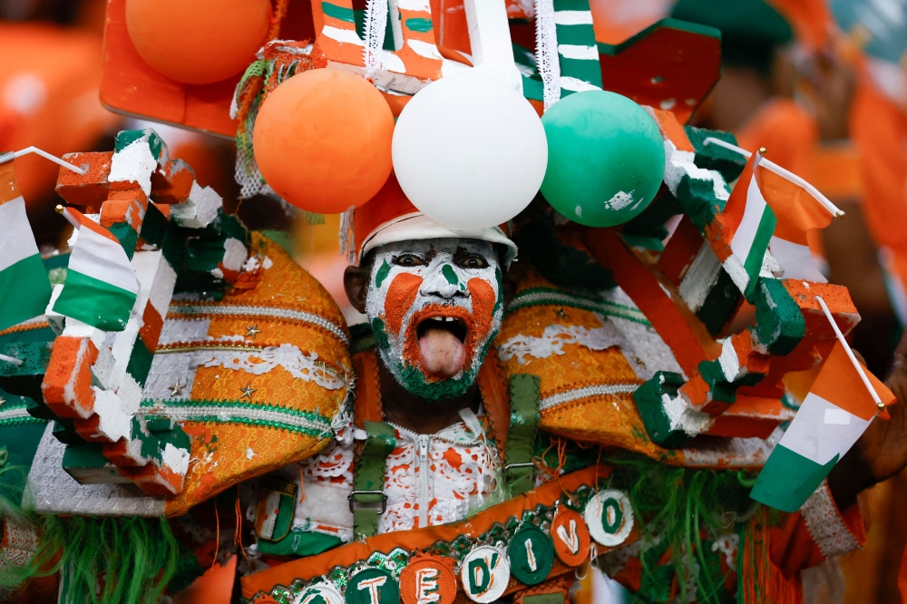 An Ivory Coast supporter cheers ahead of the Africa Cup of Nations (CAN) 2024 final football match between Ivory Coast and Nigeria at Alassane Ouattara Olympic Stadium in Ebimpe, Abidjan February 11, 2024. — AFP pic 