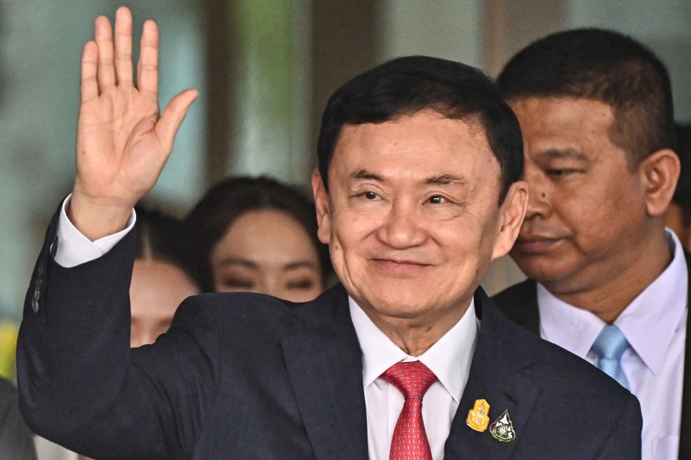 Jailed former Thai prime minister Thaksin Shinawatra will be freed, the kingdom's justice minister said on February 13, 2024, possibly as soon as the weekend. ― AFP file pic