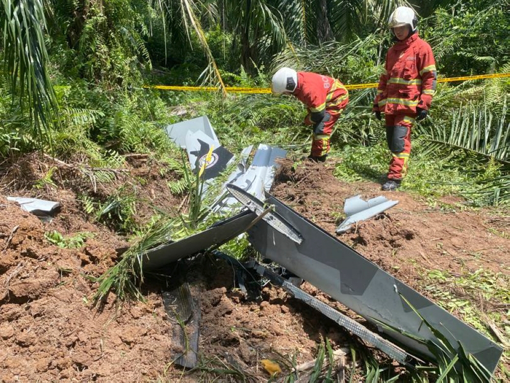 Personnel from the Fire and Rescue Department inspect the crash site in Kapar February 13, 2024. — Picture courtesy of Fire and Rescue Department