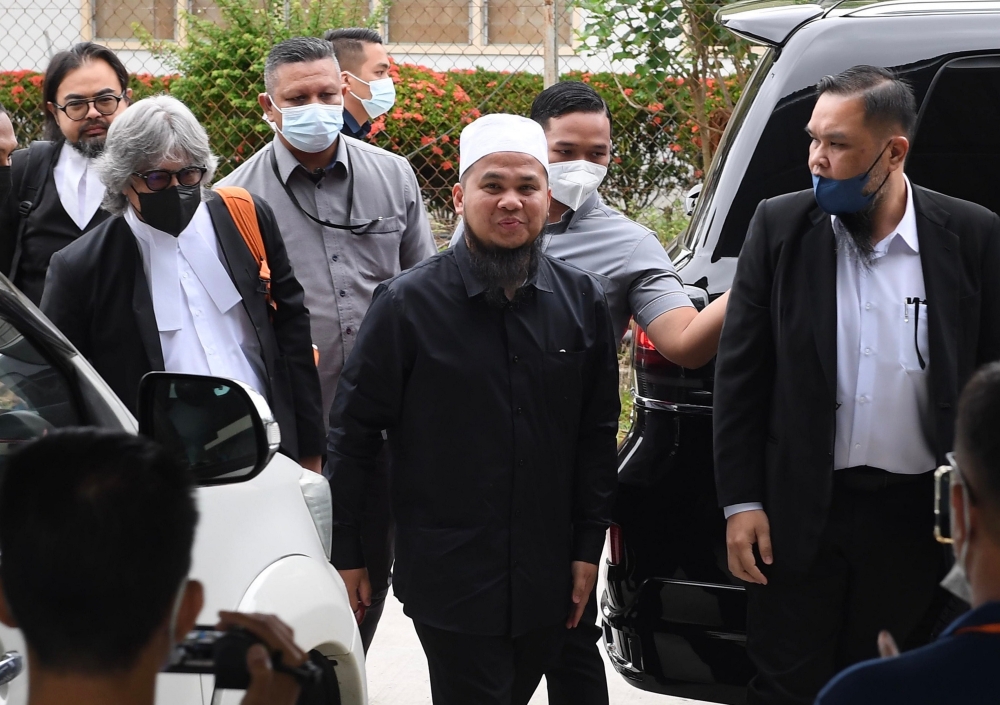 File picture of reacher Ebit Lew arriving at the Tenom Magistrates’ Court in Sabah September 27, 2022. — Bernama pic