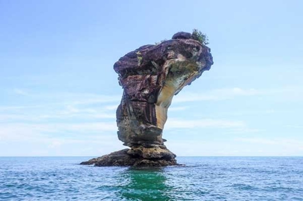 An old photo of the sea stack. — Borneo Post pic