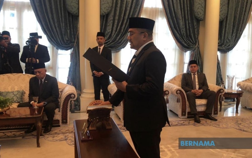 Pelangai state assemblyman Datuk Amizar Abu Adam swears in as the State Executive Council member at Istana Abdulaziz February 13, 2024. — Picture via X/Bernama 