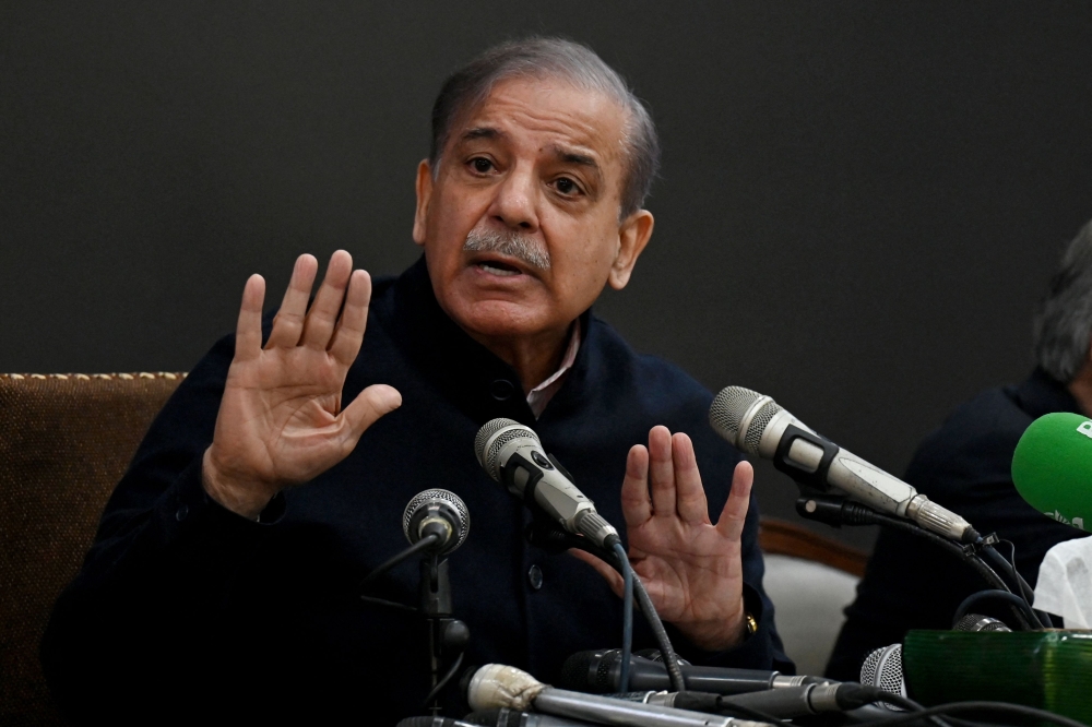 Pakistan's former Prime Minister and leader of the Pakistan Muslim League-Nawaz (PML-N) party Shehbaz Sharif speaks during a press conference in Lahore on February 13, 2024. — AFP pic