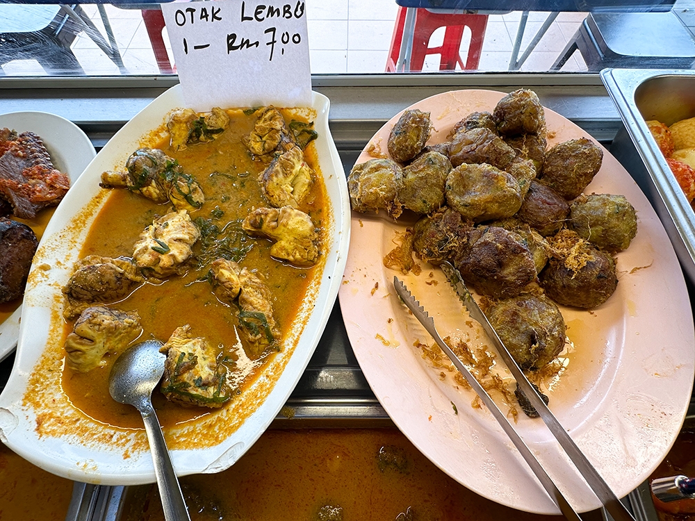 How about some cow's brains and 'begedil' lwith your lunch?
