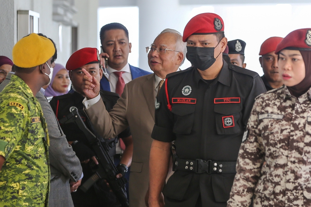 Former prime minister Datuk Seri Najib Razak arrives at the High Court in Kuala Lumpur February 14, 2024. — Picture by Yusof Mat Isa